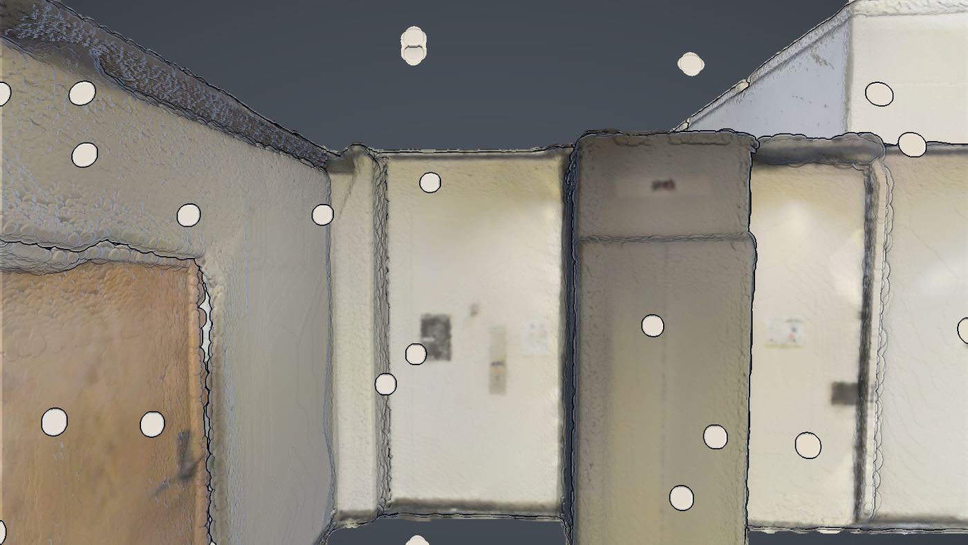 Indoor scan corridor rendered as oriented Gaussian surfels that blend points into smooth continuous walls