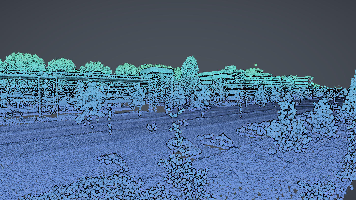 Standing in a Dutch street inside national aerial LiDAR, buildings and street trees coloured by height