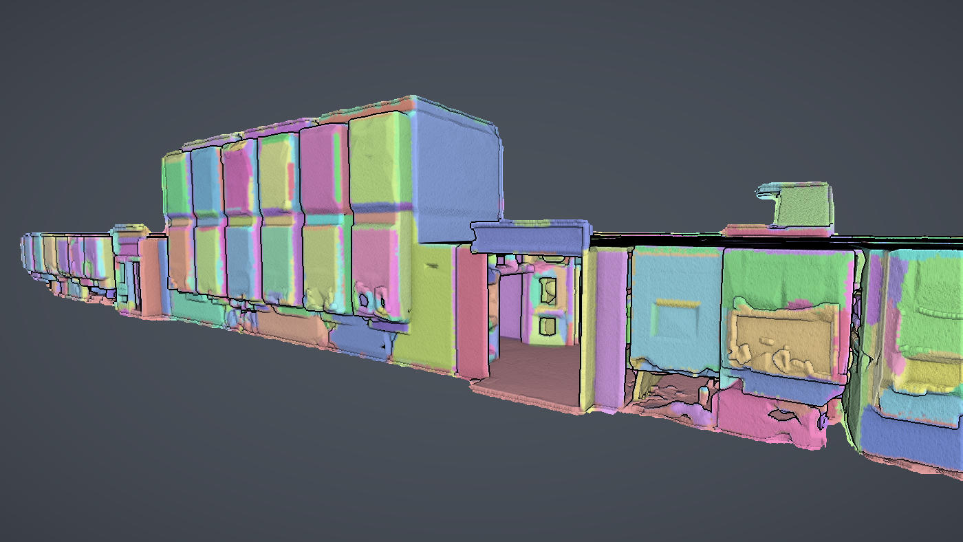 Part of the office floor decomposed by parameter-free segmentation, every surface its own colour